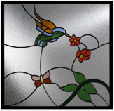 Stain glass art with butterfield hummingbirds